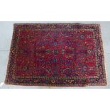 Persian rug, red field with allover foliate pattern with flowerhead borders, 156 x 103cm