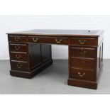 Mahogany pedestal desk, rectangular top with an inset leather skiver, over an arrangement of nine