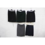 Five skirts to include Yves Saint Laurent Rive Gauche and a Donna Karan grey wool skirt, sizes