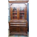 19th century Gothic Revival walnut secretaire bookcase with a glazed upper section over a secretaire
