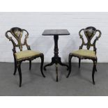 A pair of Victorian lacquered papier mache and mother of pearl inlaid chairs, decorated with gilt