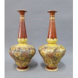 A pair of Doulton Lambeth Chine-Ware vases with impressed factory marks and numbers, 26cm high (2)