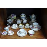 Miniature pottery and porcelain cups and saucers to include Hammersley, Crown Staffordshire, etc (