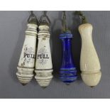 Four late 19th / early century ceramic 'Pull' handles on chains (4)