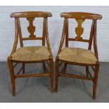 A pair of 19th century side chairs of small proportions with cured top rail solid vasiform splat and