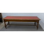 Early 20th century oak library table with a red leather skiver (small square shaped cut in skiver)