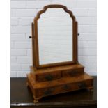 Walnut dressing table mirror with serpentine top over two short drawers and two longer drawers, on