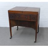 Georgian mahogany washstand with fold out top opening to reveal fitted compartments above three