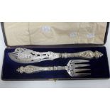 A cased set of white metal fish servers, engraved with Anglers, in original fitted case