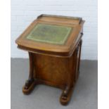 Victorian walnut Davenport with a three quarter brass gallery and green leather skiver, the