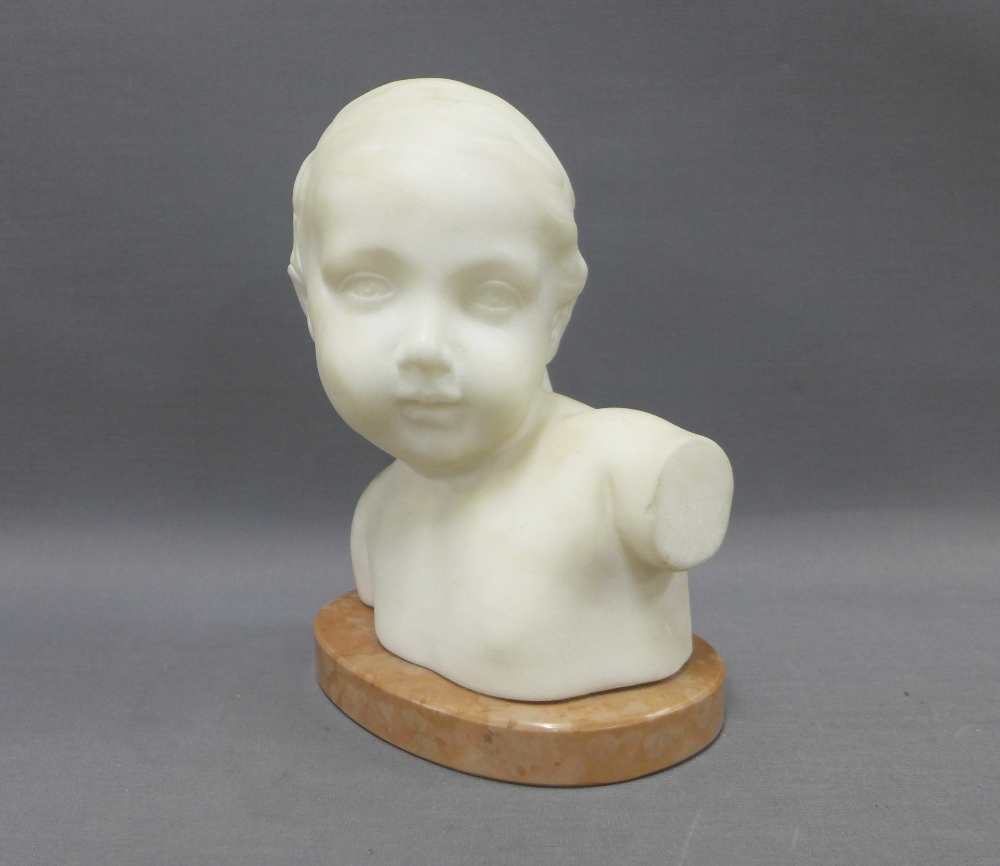 White hardstone head and shoulders bust of a young child on an pink oval marbled base, 22cm - Image 2 of 3