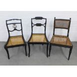 Two 19th century black lacquer, parcel gilt and brass mounted side chairs with bergere backs and