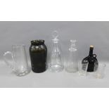 Collection of glass to include a floral etched water jug, carafe, two etched beakers, contemporary