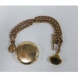 9ct gold Albert watch chain with T-bar, a revolving citrine fob set in an 18ct gold frame together