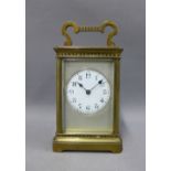 Late 19th century French brass carriage clock, the silver engine turned dial with Arabic numerals