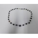 Victorian banded agate and crystal beads, graduating in size from 2cm - 0.5cm