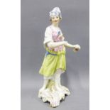 Berlin porcelain figure of a woman, modelled standing with a tankard of ale, blue scepter backstamp,