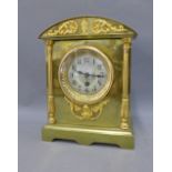 Junghans brass mantle clock with a silvered dial and Arabic numerals, 27 x 21cm