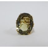 9ct gold smoky quartz dress ring, claw set oval stone in an open work setting, Edinburgh 1972, UK