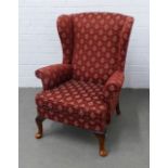 Wing armchair with red damask style upholstery and mahogany cabriole legs 72 x 98 x 50cm
