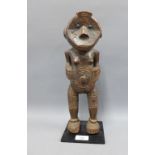 African Luena type carved wooden figure on a square plinth base, height overall 36cm