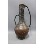 Japanese bronze bottle neck vase with moulded leaf pattern and loop handles on a plain circular