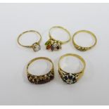 Five 9ct gold gemset rings to include a garnet ring with one small stone missing (5)