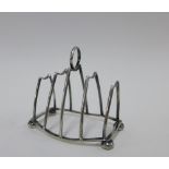 George V silver toastrack, Birmingham 1931, 8.5cm long