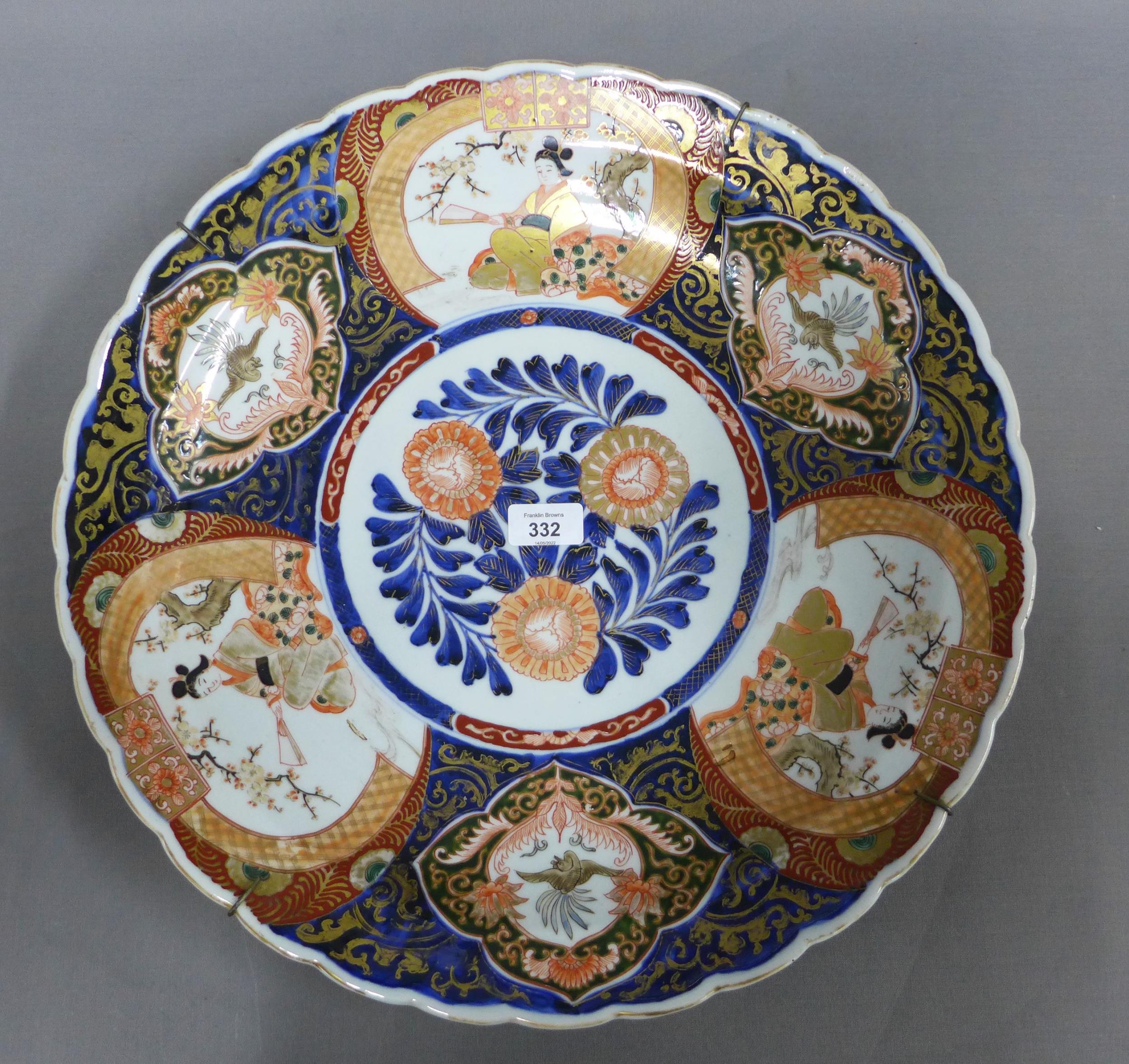 Large Imari charger, scallop edge with typical pattern of flowers and foliage, 46cm