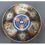 Large Imari charger, scallop edge with typical pattern of flowers and foliage, 46cm
