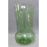 Large green glass vase with flatted base and flared body, 45cm