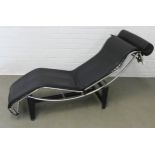 After Le Corbusier, a chrome and black leather daybed, on black metal base, 171 x 61 (adjustable)