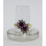 18ct gold ruby and diamond cluster ring, London 1979