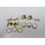 Three 9ct gold wedding bands, three 9ct gold gemset rings and a collection of costume jewellery (a