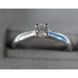 Diamond & platinum solitaire ring, claw set with a brilliant cut diamond, approx. 0.25ct, stamped