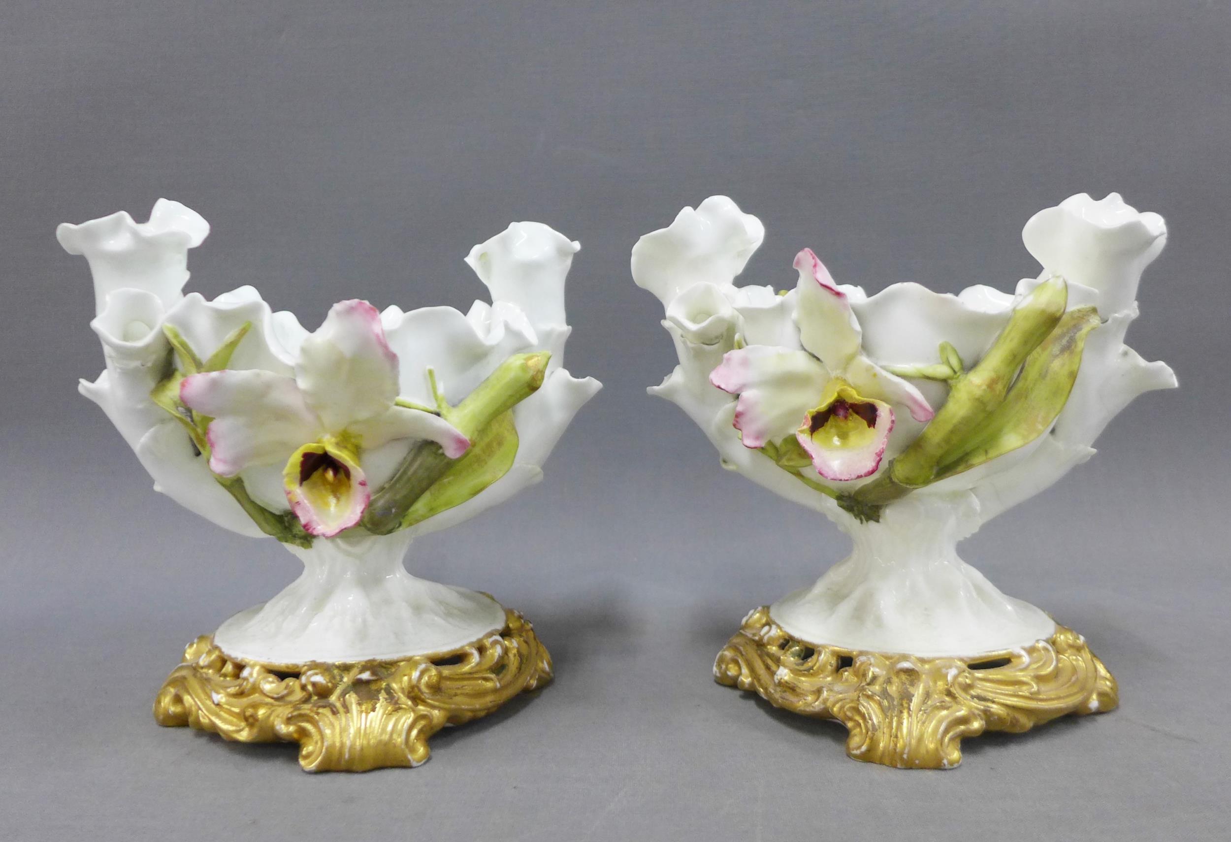 A pair of Moore Bros white glazed porcelains posy vases, floral encrusted, 16cm (2)