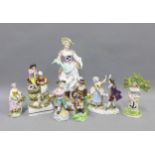 A group of Staffordshire pottery and continental porcelain figures to include a pearlware figure