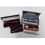 Parker pen set, an oversize ball point pen and a Fisher Space Pen together with gents vintage Swiss