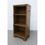 Attributed to Whytock & Reid, a small waterfall bookcase, 35 x 76 x 24cm