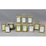 Eleven various brass and glass panelled carriage clocks, (11)