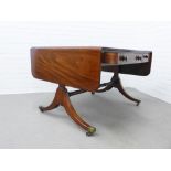 Mahogany sofa table of large proportions, frieze drawers with bun handles, on shaped side supports
