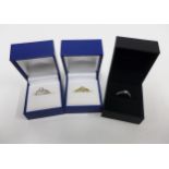 Three 18ct gold diamond solitaire rings, two set in white gold and the other in yellow gold (3)