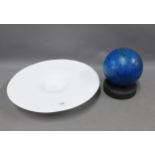 A large opaque white glass dish of flattened form, 40cm, together with a marble effect blue glass