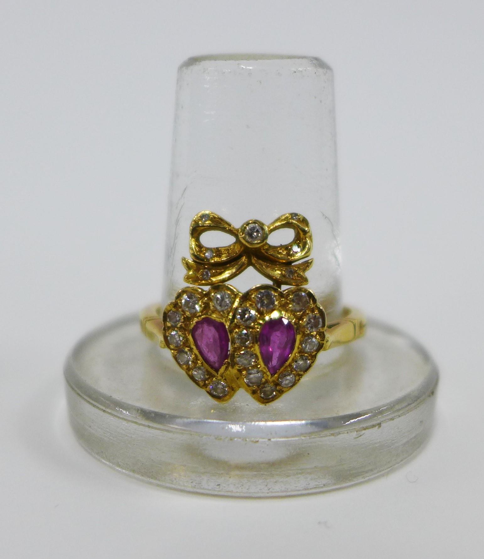 18ct gold ruby and diamond ring with a double heart and ribbon bow setting, London 1978 - Image 2 of 4