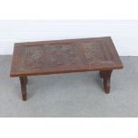 Hardwood stool with a rectangular carved top, 65 x 28 x 32cm