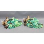 A pair of Continental porcelain squirrel and acorn leaf wall vases, with blue printed R