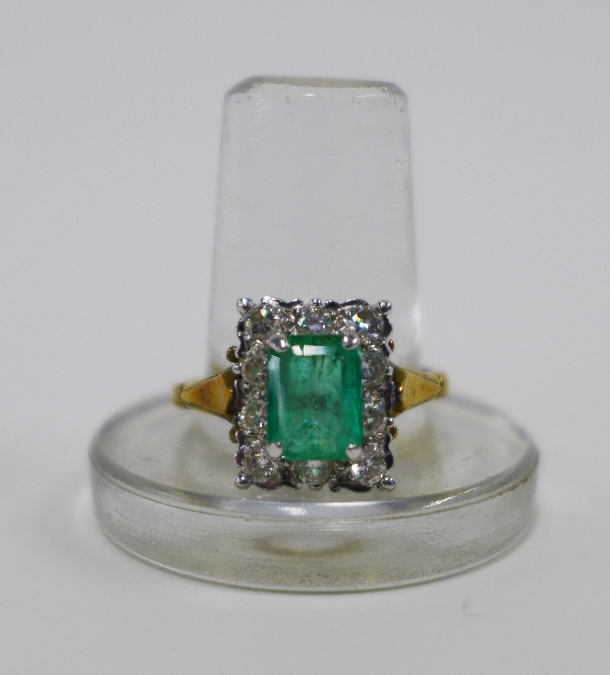 18ct gold emerald and diamond cocktail ring, claw set with a step cut emerald within a surround of - Image 2 of 4