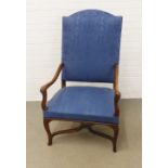 Walnut framed open armchair with blue upholstered back and seat, with a cross stretcher and hoof