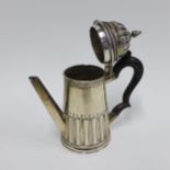 WITHDRAWN George III silver coffee pot of small proportions and fluted form with a straight taperin