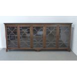 Mahogany low bookcase, with five astragal glazed doors with adjustable shelves, 260 x 114 x 33cm